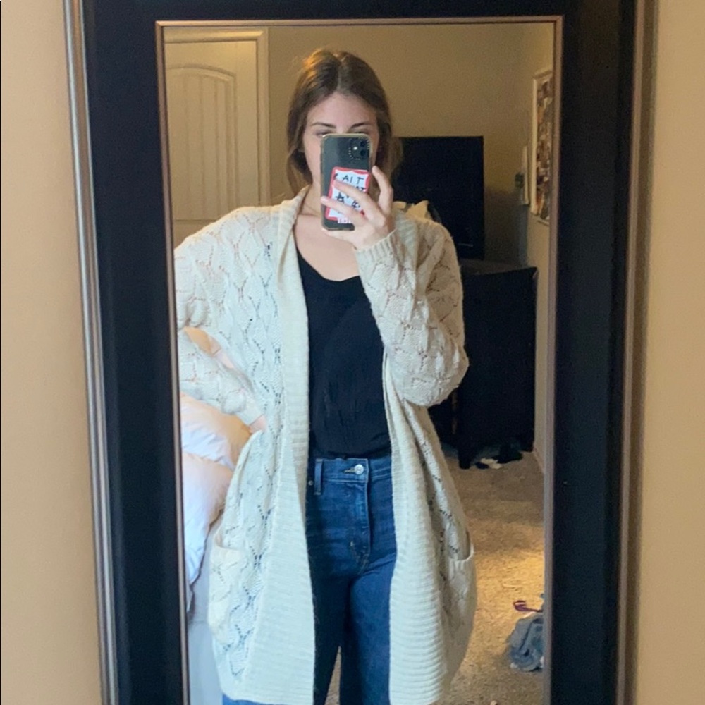 Cream colored knit type cardigan
